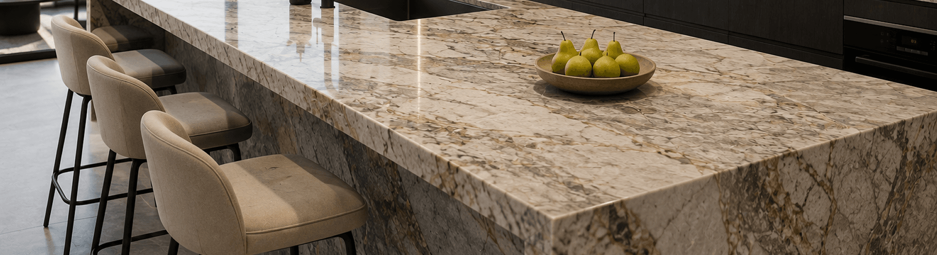Polished natural stone kitchen island benchtop with bar seating