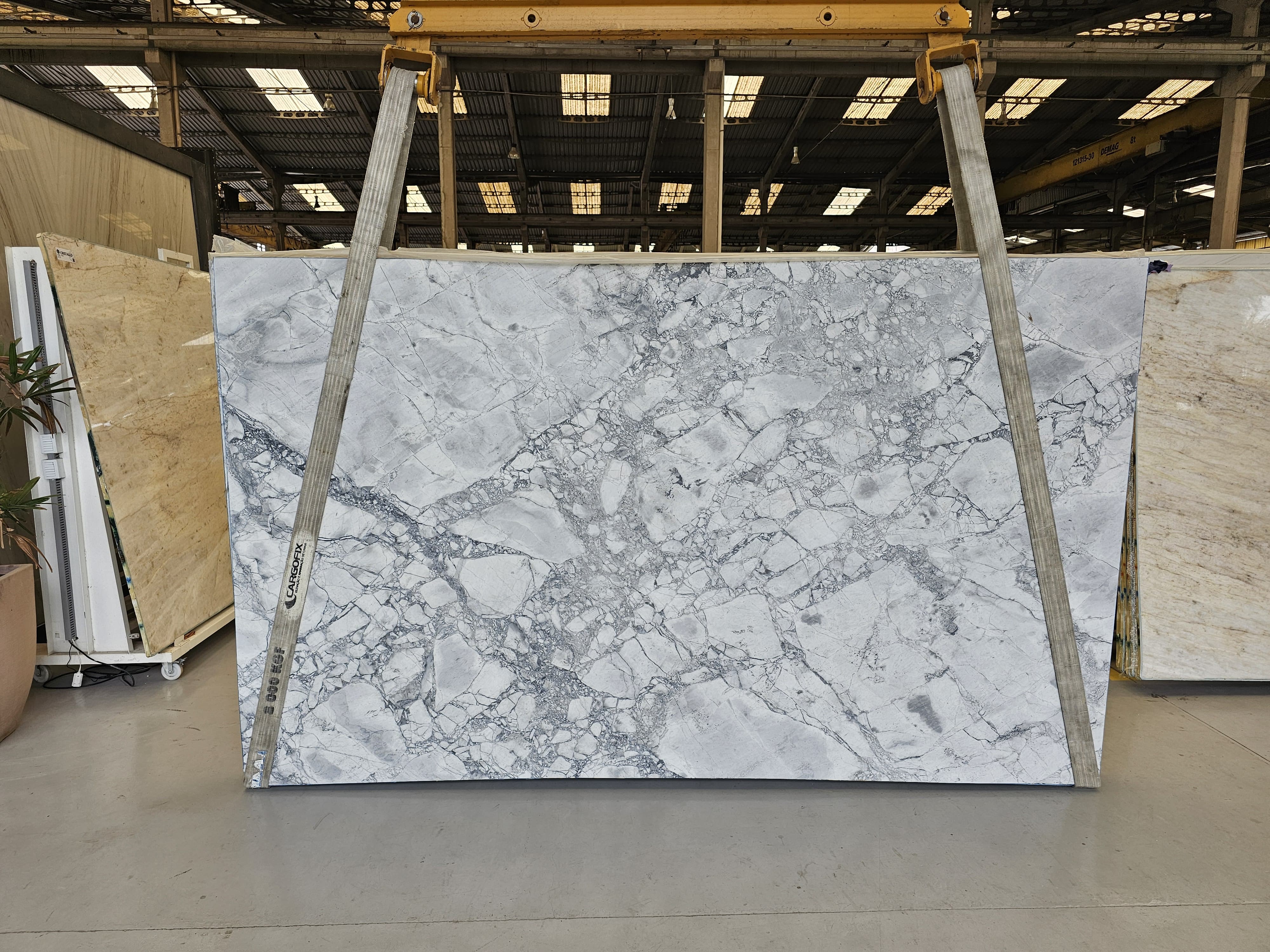 Natural stone slab displayed in the StoneMart showroom